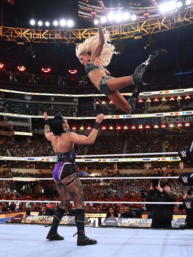 Charlotte Flair leaps at Rhea Ripley at Wrestlemania in LA. Picture: WWE