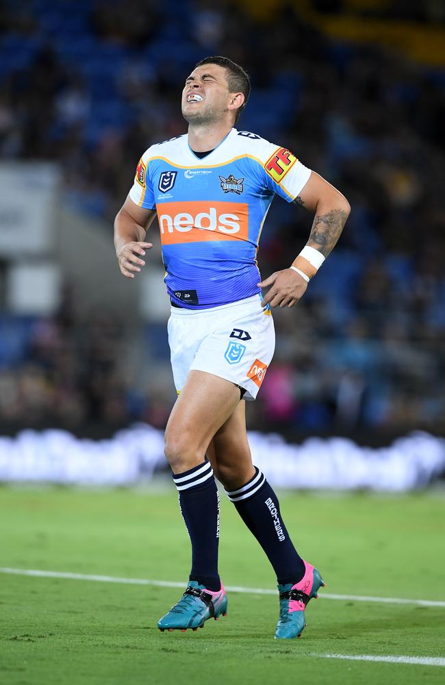 Ash Taylor left the field with injury. (AAP Image/Dave Hunt) 