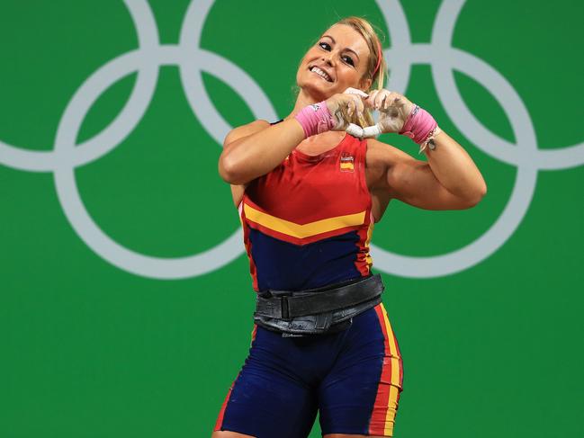 RIO DE JANEIRO, BRAZIL - AUGUST 12: Lidia Valentin Perez of Spain celebrates during the Weightlifting - Women's 75kg Group A on Day 7 of the Rio 2016 Olympic Games at Riocentro - Pavilion 2 on August 12, 2016 in Rio de Janeiro, Brazil. (Photo by Mike Ehrmann/Getty Images)