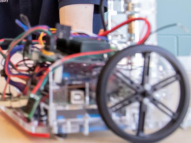 Ryoma Ohira and Tim Braithwaite are ready to take on Japan with their sumo robots. Picture: Luke Marsden.