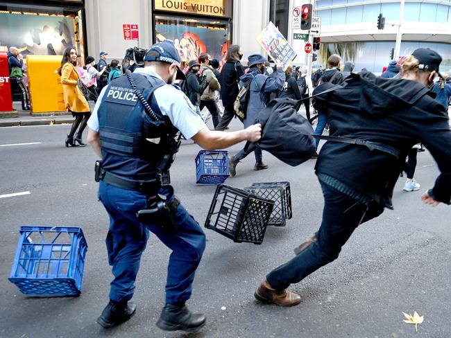 Protesters using milk crates to disrupt Sydney traffic. Picture: NCA NewsWire.