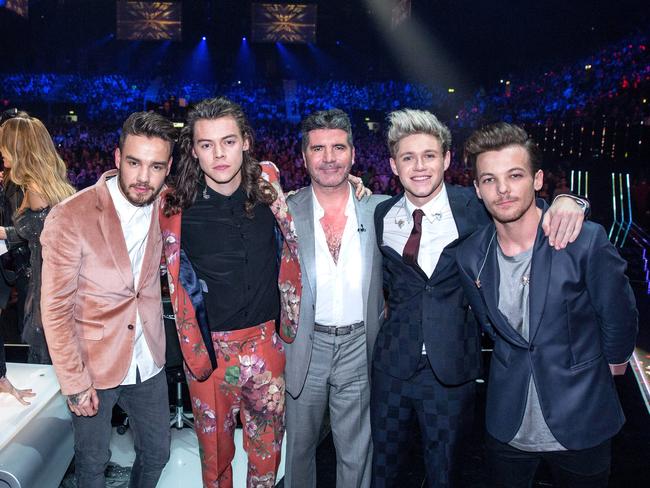 The godfather? ... One Direction svengali Simon Cowell said he’d be happy to be the baby’s godfather. Just don’t ask him about nappies. Picture: Syco/Thames/Corbis/Dymond