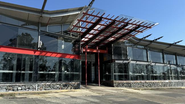 The Ashmore Steak and Seafood restaurant and neighbouring businesses were supposed to have made way for a new development by Churchill Development Group but has been in disrepair for more than two years.