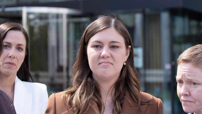 An upset Brittany Higgins with her partner David Sharaz leaving the Magistrates Court in Canberra. Picture: NCA NewsWire / Gary Ramage