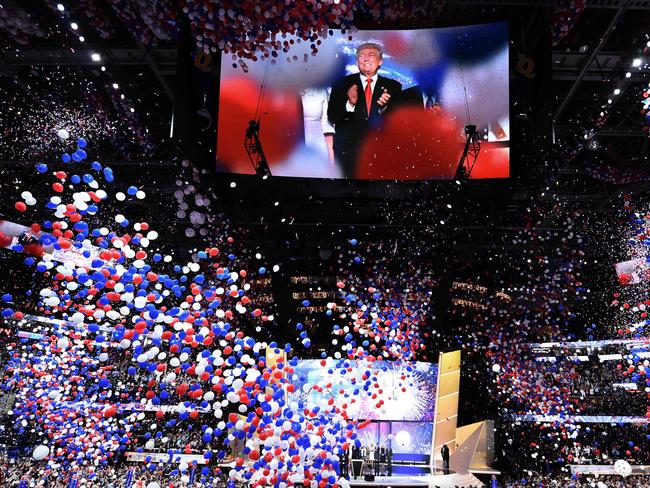 Donald Trump in 2016 as the balloons filled the stadium. Picture: AFP