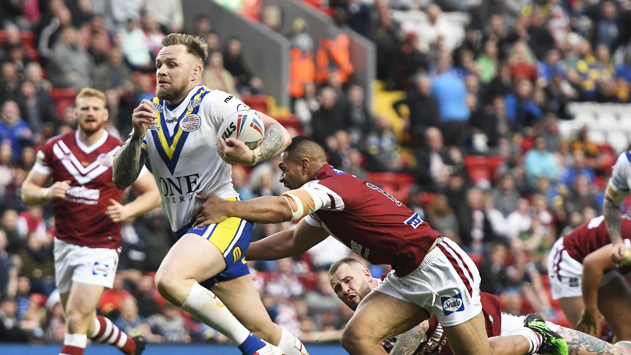 Blake Austin scores a try for Warrington Wolves