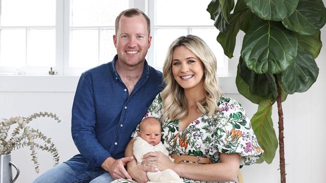 Kendall Gilding at home with husband Tim Morgan and one-week-old Moses. Picture: Tara Croser.