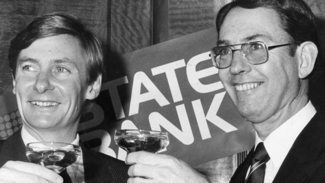 Former premier John Bannon toasts to the bank’s success with Tim Marcus Clark.