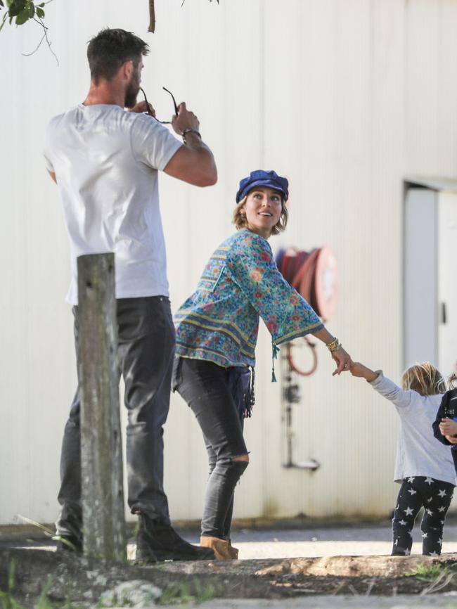 Elsa hangs on to one of her twin boys at the farm. Picture: Media Mode