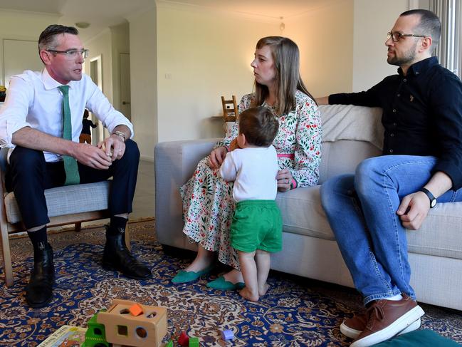 Premier Dominic Perrottet speaks to first home buyers Chloe Flannery and Derek Halawa at Schofields on Thursday. Picture: NCA NewsWire