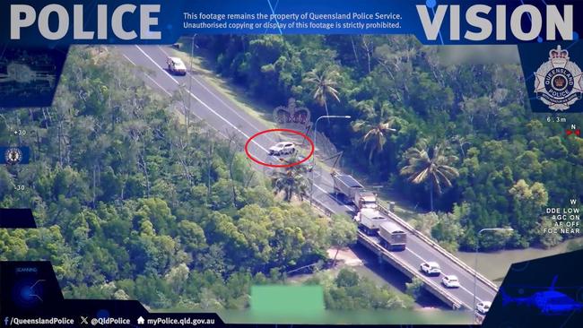 Dramatic footage has been released of the moment an 18-year-old was arrested after quick-thinking truckies helped authorities stop an allegedly stolen vehicle in Cairns. Picture: QPS.