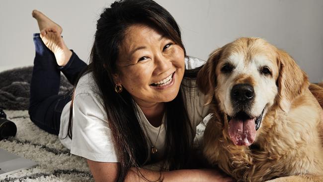 Nagi Maehashi with Dozer checking book proofs