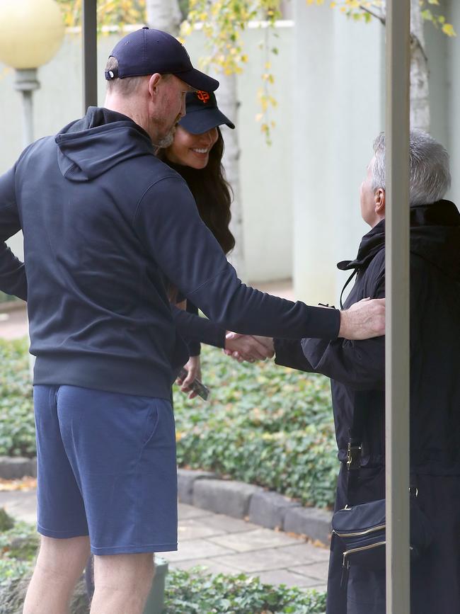 The couple stopped briefly to speak to an elderly couple. Picture: Matrix Media Group