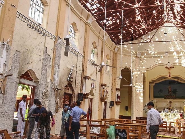 Dead bodies of victims lie inside St. Sebastian's Church damaged in blast in Negombo, north of Colombo, Sri Lanka. Picture: AP