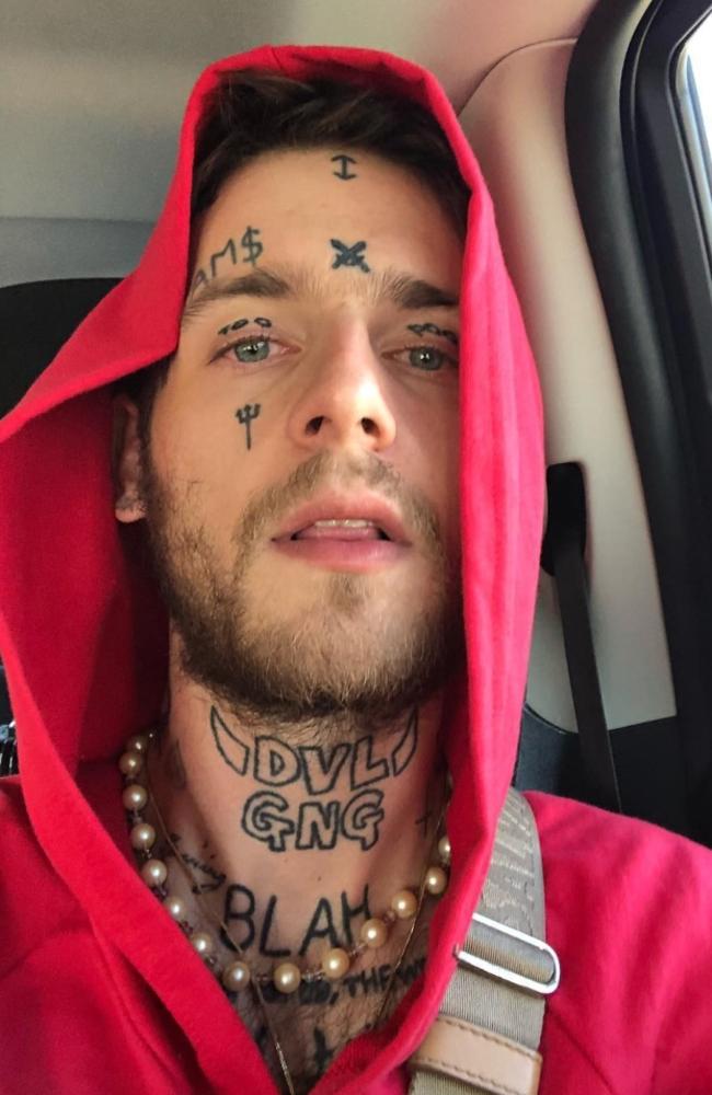 Lottie is enjoying a romance with tattooed rapper Milkavelli. Picture: Instagram/milkavelli