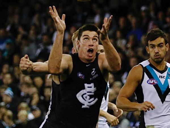 AFL: Round 8 Carlton v Port Adelaide at Etihad Stadium, 15th May, Melbourne Australia. Carlton's Matthew Kreuzer takes a mark in the third quarter Picture : George Salpigtidis
