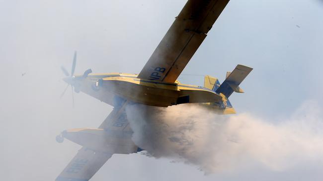 Water bombers over the resort today. Picture: Peter Lorimer.