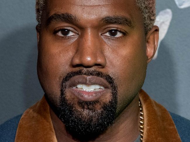 NEW YORK, NEW YORK - DECEMBER 02: Kanye West attends the the Versace fall 2019 fashion show at the American Stock Exchange Building in lower Manhattan on December 02, 2018 in New York City. (Photo by Roy Rochlin/Getty Images)