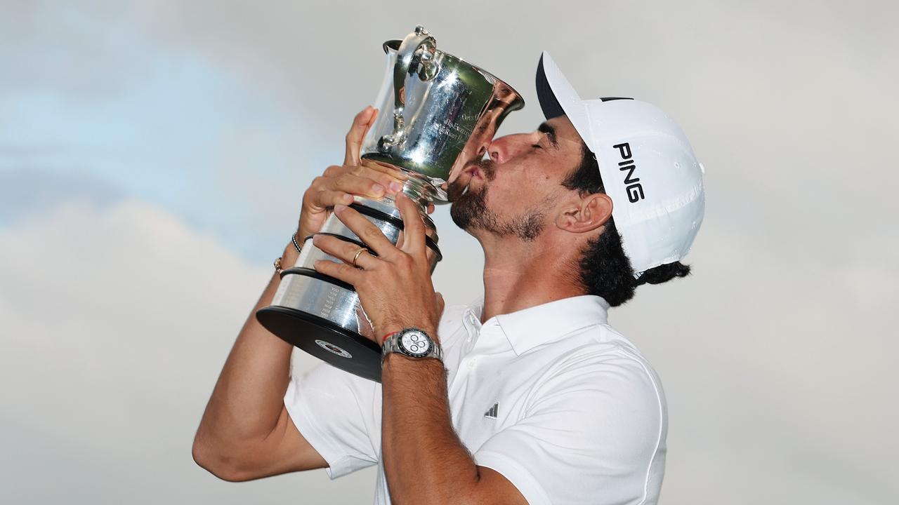 SYDNEY, AUSTRALIA - DECEMBER 03: Joaquin Niemann of Chile kisses the Stonehaven Cup after winning the Men's ISPS HANDA Australian Open on the 18th green following the ISPS HANDA Australian Open at The Australian Golf Course on December 03, 2023 in Sydney, Australia. (Photo by Mark Metcalfe/Getty Images)