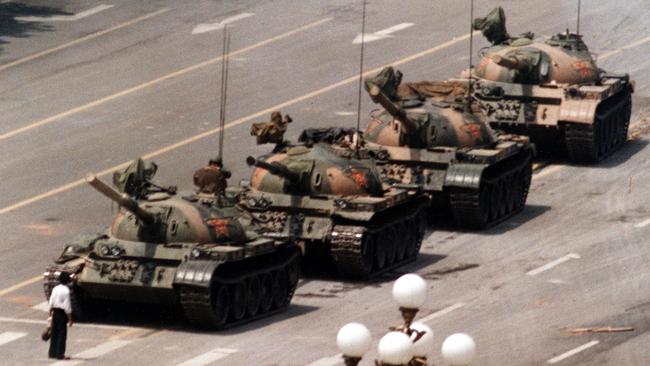 A Chinese protester blocks a line of tanks in Tiananmen Square in 1989.