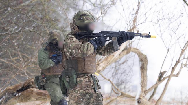 Ukrainian trainees perform a section attack during a field phase of the first rotation of Operation Kudu in the United Kingdom. *** Local Caption *** Australia continues to stand with the people of Ukraine, and is providing ongoing support in response to Russiaâs continuing violation of international law.  Having arrived the United Kingdom in January 2023, a contingent of up to 70 ADF personnel have joined partner nations in the UK-led and based training programme for Ukrainian recruits.