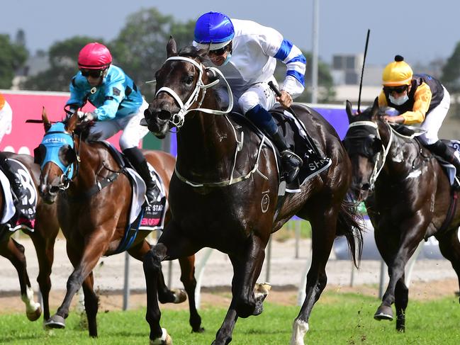 Hugh Bowman rides Shaquero to victory in the Magic Millions 2YO Classic. Picture: Trackside Photography