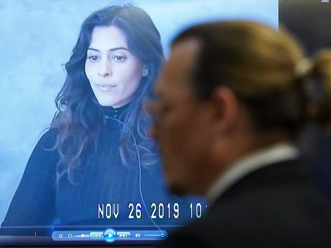 Actor Johnny Depp listens to a previously recorded video deposition by Elizabeth Marz during his defamation trial against ex-wife Amber Heard at the Fairfax County Circuit Courthouse in Fairfax, Virginia, on May 18, 2022. Picture: AFP