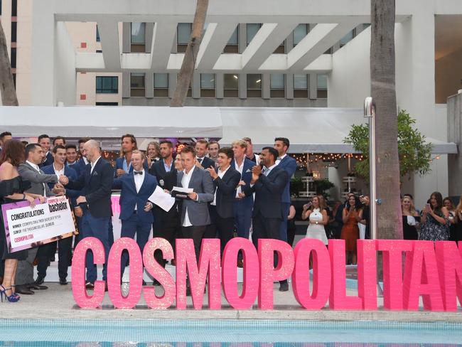 What seems like thousands of blokes in blue suits and a whopping great, big bloody, bonza cheque to show it was an important event. Sarah like big cheques and cannot lie ...