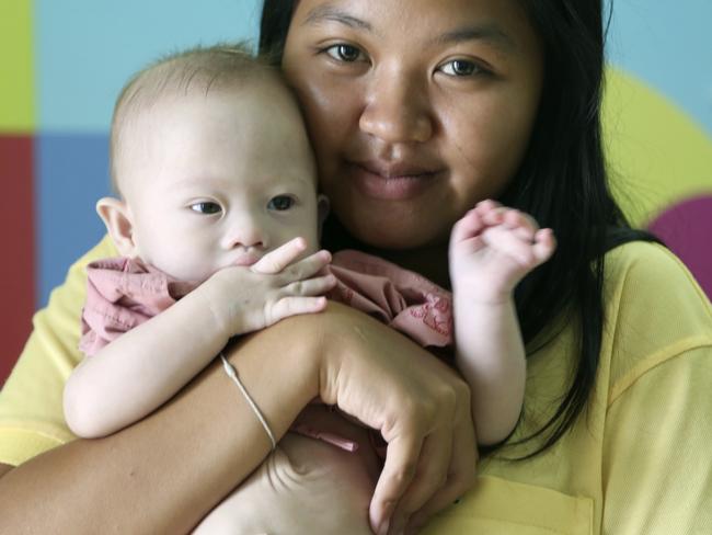 Pattaramon Chanbua, 21, poses with her baby boy Gammy. AP Photo/Apichart Weerawong