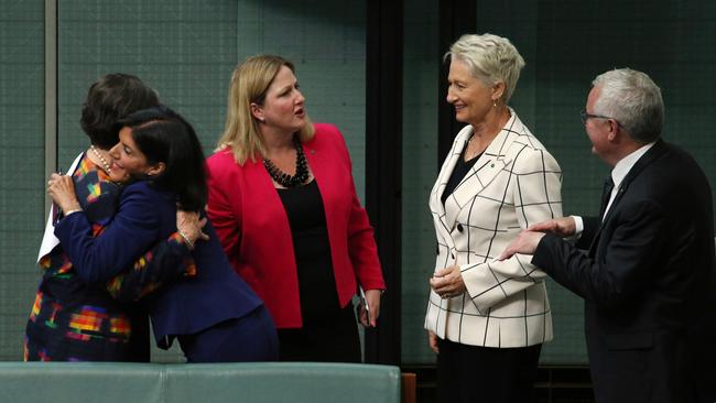 Ms Banks embraces independent Cathy McGowan and meets with crossbenchers Rebekha Sharkie, Kerryn Phelps and Andrew Wilkie. Picture: Gary Ramage