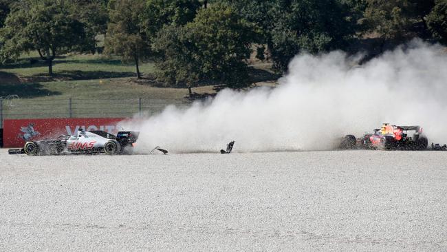 Haas F1's French driver Romain Grosjean (L) and Red Bull's Dutch driver Max Verstappen crash during the Tuscan GP. Picture: AFP