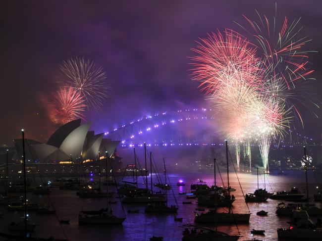 Fireworks explode over Sydney Harbour during New Year's Eve. Picture: AAP Image/David Moir