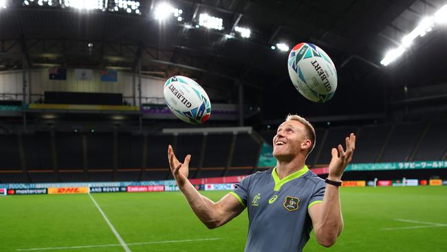 Winger Reece Hodge juggles footballs at the Wallabies’ Captain’s Run at the Sapporo Dome on Friday. Picture: Getty Images