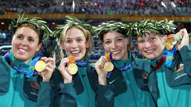 Swimmers (from left) Petria Thomas, Jodie Henry, Giaan Rooney and Leisel Jones pose with their gold medals after they won the medley relay at the 2004 Athens Olympic Games.