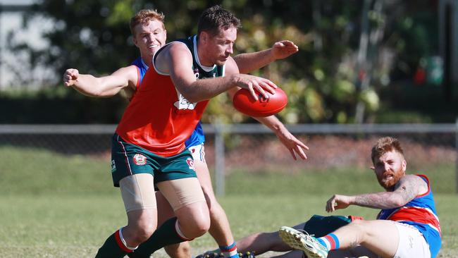 Bulldogs' Will Reilly tackles Cutters' Michael Rowe. Picture: Brendan Radke