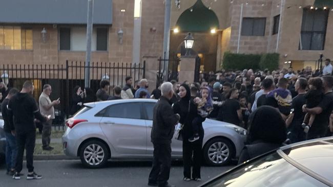 Crowds at the end of the commemoration service on Saturday at Al Rahman Mosque, Kingsgrove.