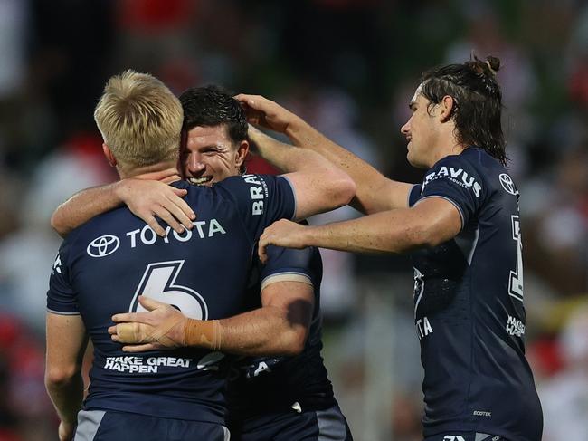 SYDNEY, AUSTRALIA - MARCH 23: Chad Townsend of the Cowboys celebrates scoring a try during the round three NRL match between St George Illawarra Dragons and North Queensland Cowboys at Netstrata Jubilee Stadium on March 23, 2024 in Sydney, Australia. (Photo by Jason McCawley/Getty Images)