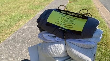 Photograph of illegal rubbish dumped on a footpath sparking an investigation on the Gold Coast.