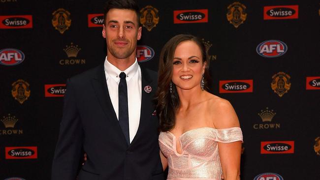 Daisy Pearce arrives at the Brownlow Medal with partner Angus Parry.