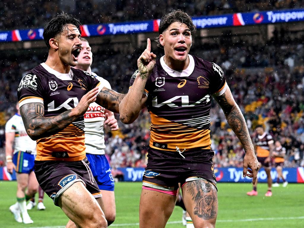 Reece Walsh does the viral ‘What’s up brother’ celebration after scoring for the Broncos. Picture: Getty Images