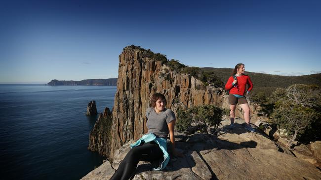 04/12/2015: Kathy Willis (front) and Anne Knox take in the views from the Three Capes Track in Southern Tasmania. Stuart McEvoy for The Australian.