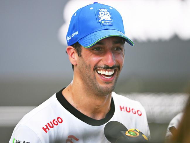 MIAMI, FLORIDA - MAY 04: 4th placed Daniel Ricciardo of Australia and Visa Cash App RB talks to the media in the Paddock after the Sprint ahead of the F1 Grand Prix of Miami at Miami International Autodrome on May 04, 2024 in Miami, Florida. (Photo by Rudy Carezzevoli/Getty Images)