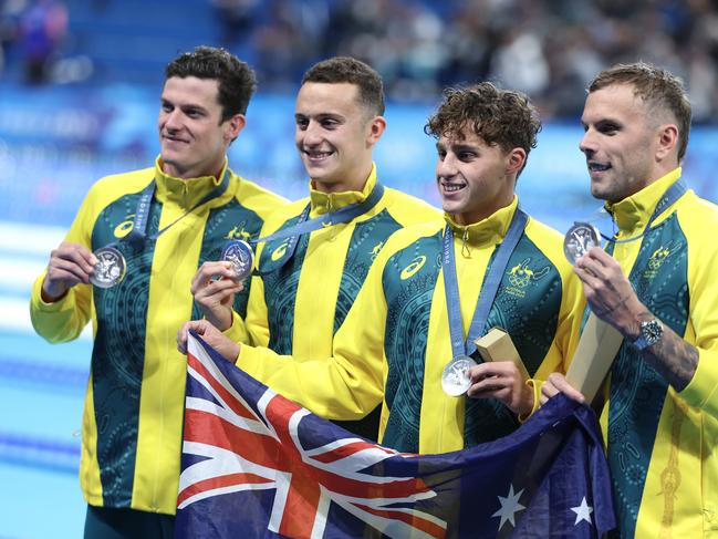 NANTERRE, FRANCE - JULY 27: Silver Medalists, Jack Cartwright, Flynn Southam, Kai Taylor and Kyle Chalmers of Team Australia pose with their medals following the Medal Ceremony after the Men's 4x100m Freestyle Relay Final on day one of the Olympic Games Paris 2024 at Paris La Defense Arena on July 27, 2024 in Nanterre, France. (Photo by Al Bello/Getty Images)