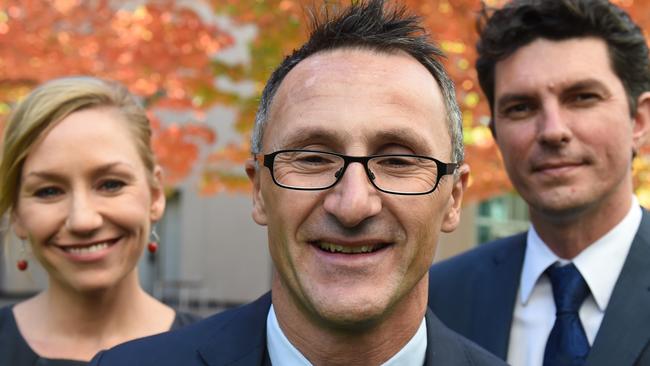 Former Greens senators Larissa Waters and Scott Ludlam with Greens Leader Richard Di Natale, centre.