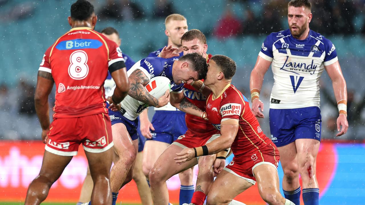 Kurt Donoghoe broke his nose in the opening 10 minutes but returned to help the Dolphins beat the Bulldogs. Picture: Cameron Spencer/Getty Images
