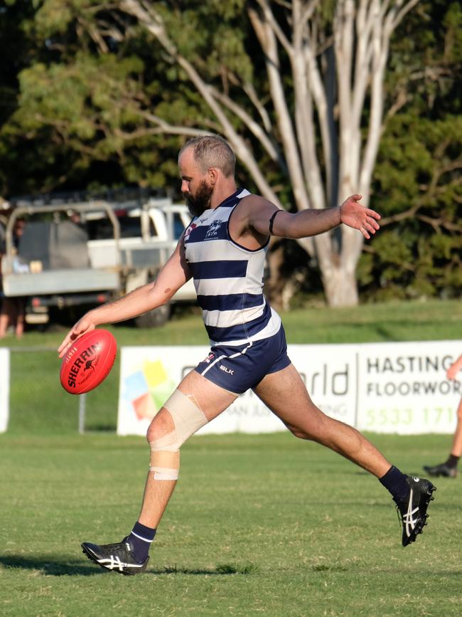 Broadbeach Cats defender Josh Searl in action against the Labrador Tigers at Subaru Oval in Round 1 of the 2021 QAFL season. Photo credit: Brooke Sleep Photography.
