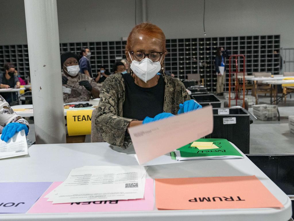 Election workers in Lawrenceville, Georgia help with the recount for the 2020 election. Picture: Megan Varner/Getty Images/AFP