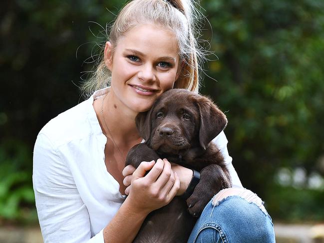 Lucy Hack,22, at home with her 11 week old Labrador pup Theo Thursday April 23,2020.Picture Mark Brake