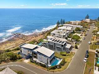 A four-bedroom house with unrestricted coastal views at 1 Bennett St, Moffat Beach, sold at auction for a Caloundra record.