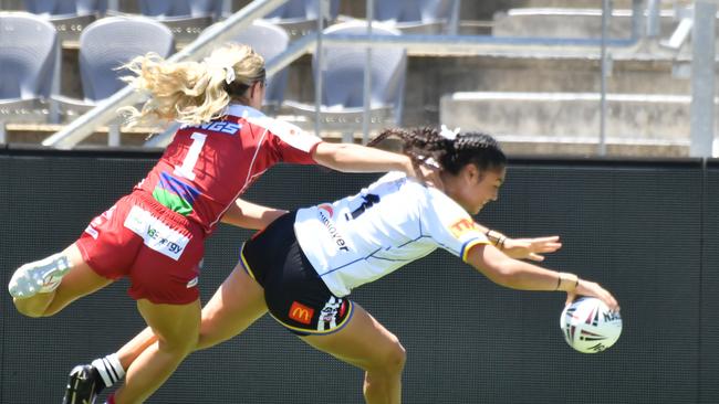 Souths Logan player Kiarah Siauane gets a try. Harvey 19s girls' game between Souths Logan and Redcliffe Saturday February 18, 2022. Picture, John Gass